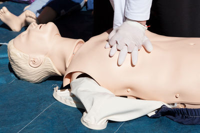 Low section of women lying on floor