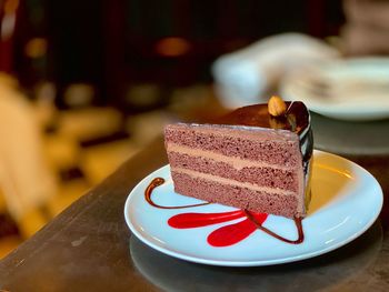 Close-up of cake in plate on table