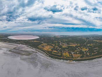 Aerial view of city against sky