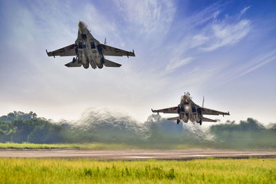 Squadron of sukhoi su30 mk2 open full thrust for taking off at short distance runway
