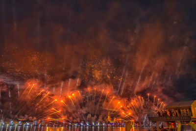 Firework display at night