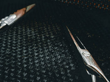 High angle view of tire tracks on wet table