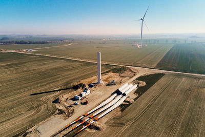 Windmill generator wing prepared for assembling, construction site for wind power generator building