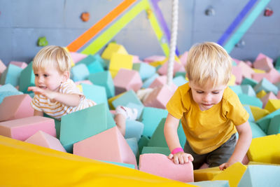 Boy playing with toy blocks