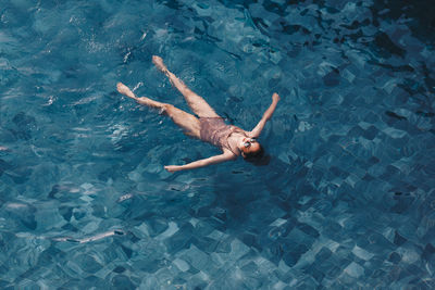 High angle view of person swimming in pool