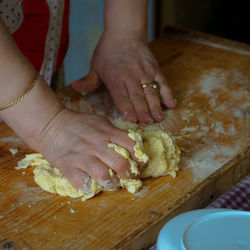 Midsection of woman preparing food
