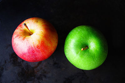Close-up of apple against black background