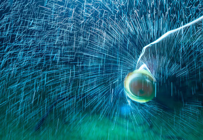 High angle view of water spraying 