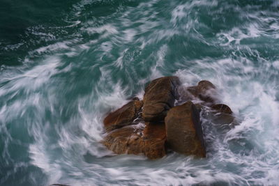 High angle view of waves in sea