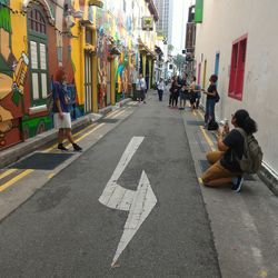 Woman walking on city street