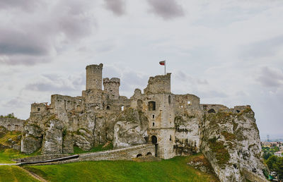 Old ruin castle against cloudy sky