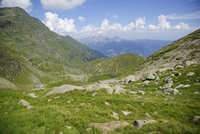 Scenic view of landscape and mountains against sky