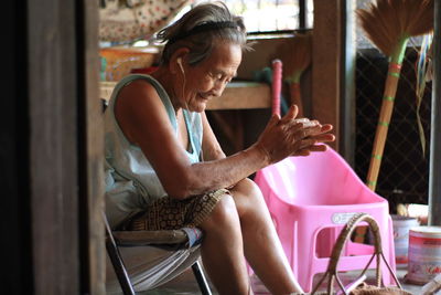 Woman sitting on chair