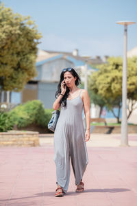 Young woman using mobile phone