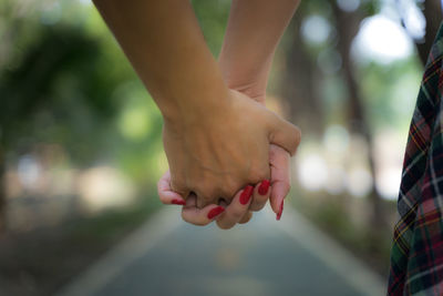 Close-up of woman hand on blurred background