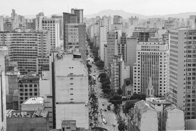 High angle view of buildings in city against sky