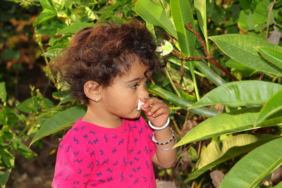 Cute girl looking away outdoors