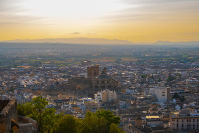 High angle view of townscape against sky during sunset