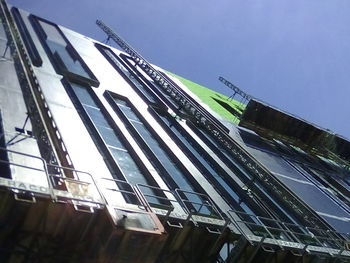 Low angle view of built structure against blue sky