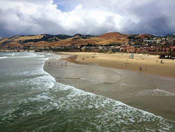 Scenic view of sea against cloudy sky