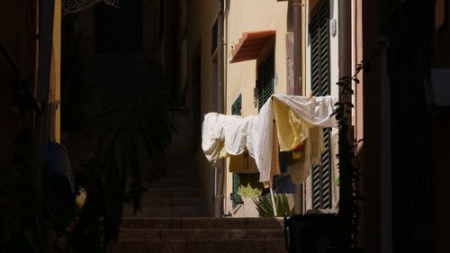 Clothes drying on clothesline outside building