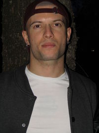Portrait of young man standing outdoors