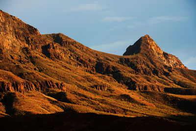 Low angle view of mountains against sky at canary islands