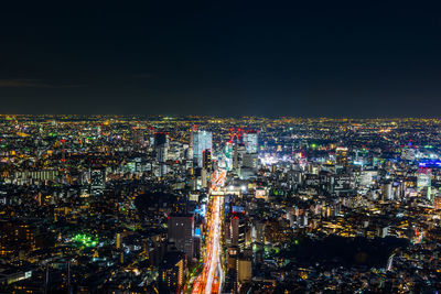 High angle view of illuminated cityscape at night