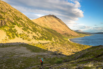 Scenic view of mountains against dramatic sky