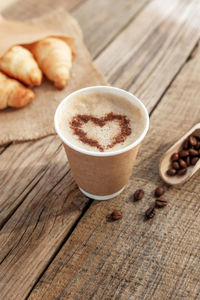 Close-up of coffee cup on table