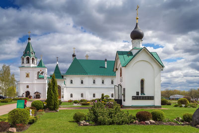 View of cathedral and buildings against sky