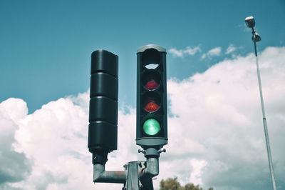 Low angle view of street light against sky