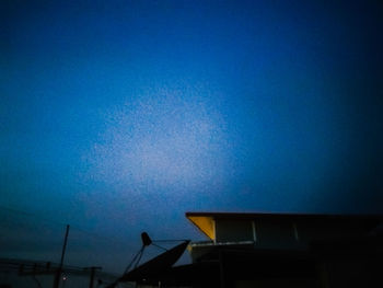 Low angle view of building against sky at night