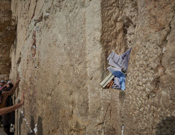 Low angle view of rock formation on wall