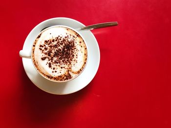 Directly above shot of cappuccino on table