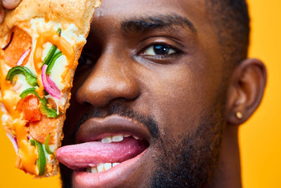 Close-up of man with dog