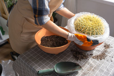 Midsection of man preparing food