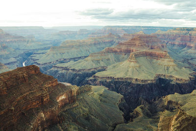 Aerial view of landscape and mountains against sky