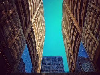 Low angle view of building against clear blue sky