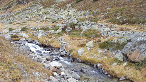 Scenic view of river amidst rock formation