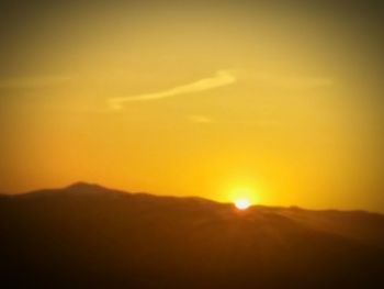 Scenic view of landscape against sky during sunset