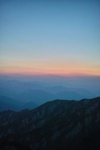 Scenic view of mountains during sunset