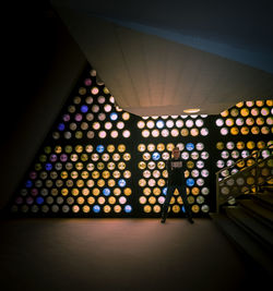 Illuminated lights on ceiling of building