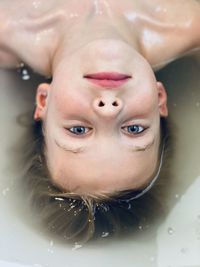 High angle portrait of girl in bathtub