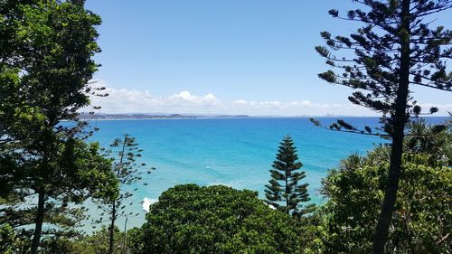 Scenic view of sea against blue sky