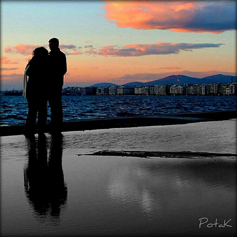 water, sunset, sea, silhouette, sky, standing, men, lifestyles, full length, leisure activity, rear view, scenics, dusk, tranquil scene, nature, tranquility, beauty in nature, pier