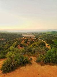 Scenic view of landscape against sky during sunset