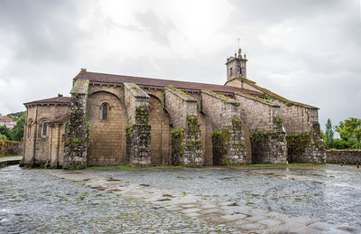 Exterior of historic building against sky