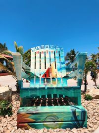 View of swimming pool against blue sky