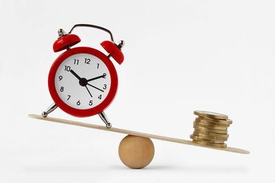 Close-up of clock tower against white background